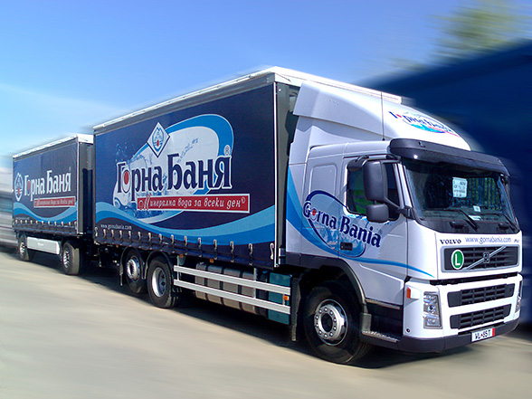 graphic design and prepress of vinyl advertising covers and advertising stickers for a Volvo truck fleet, Gorna Bania