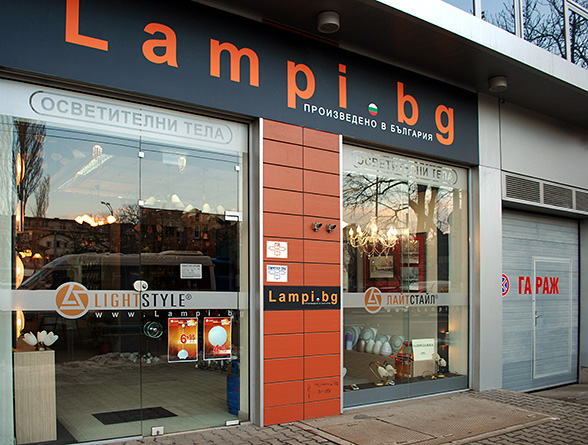 Graphic design, prepress, printing and installation of an advertising showcase for the company store and showroom, City Lux
